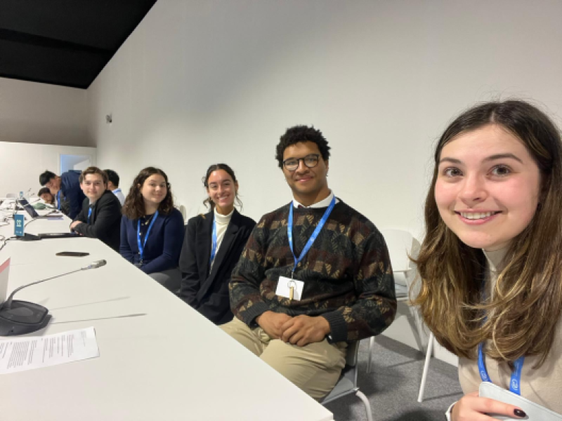 Students sitting at a long table