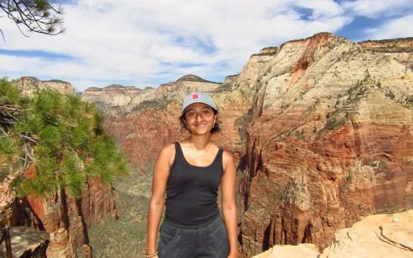 Student standing in front of a canyon in the U.S. Southwest