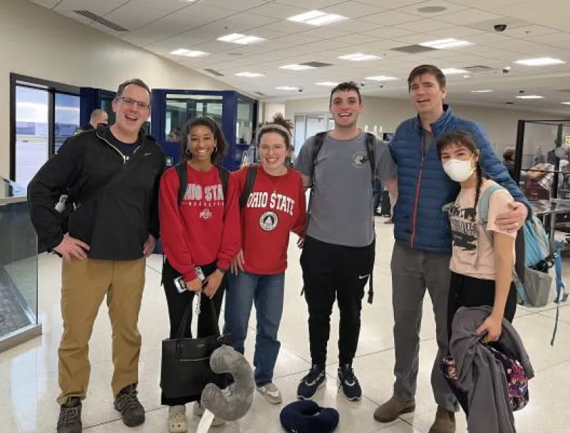 Profs Nicholas Breyfogle and Bart Elmore with Ohio State Students at John Glenn International Airport