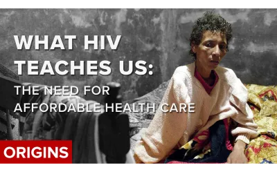 Emaciated person suffering from HIV seated on a bed