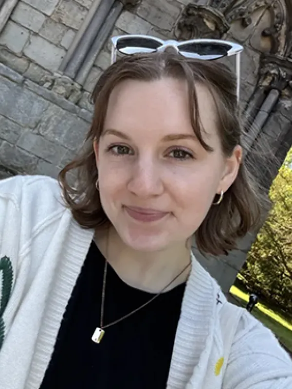 Madison Chapman in front of European architecture
