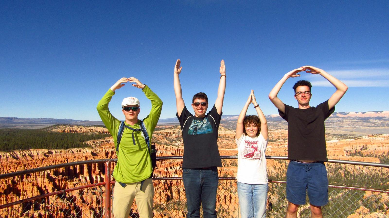 four students spelling Ohio standing in Bryce Canyon National Park 